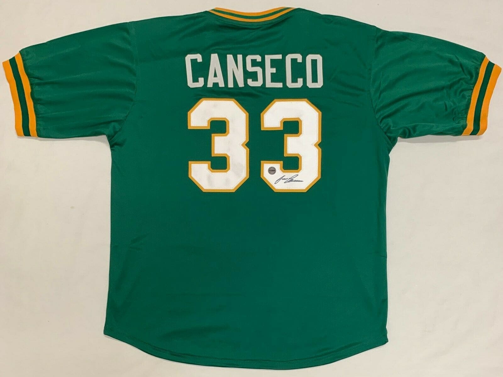 Jose Canseco Signed Autographed Green Jersey FSG Authenticated