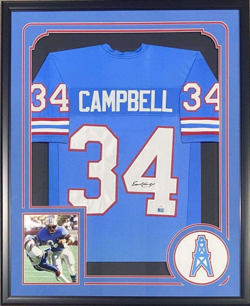 Earl Campbell Signed Autographed Framed Blue Jersey JSA Authenticated Paper Mat.