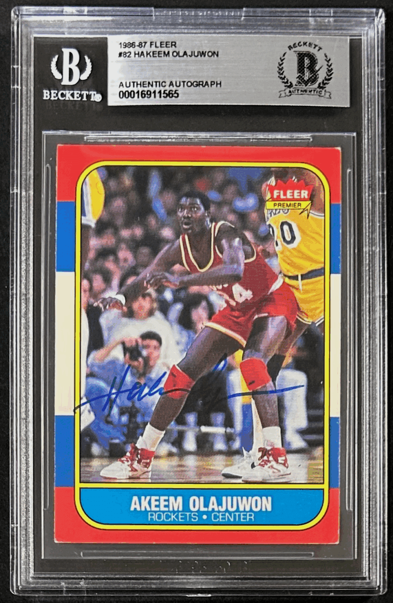 Hakeem "Akeem" Olajuwon Signed 1986-87 Fleer Rookie Card #82 Beckett 16911565