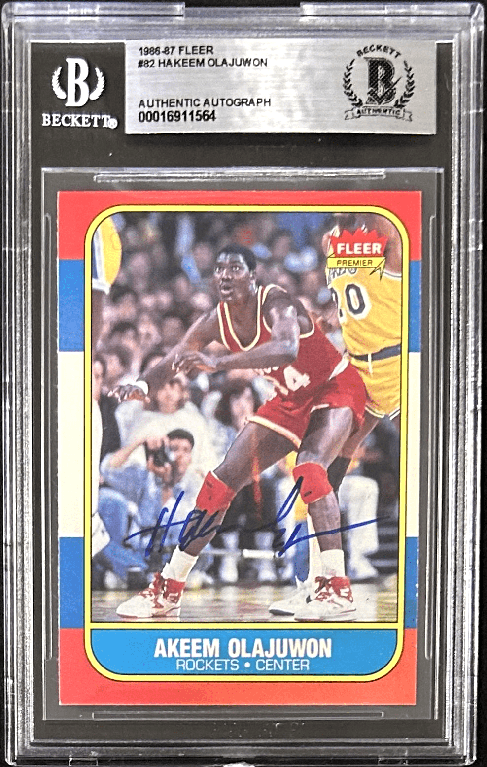 Hakeem "Akeem" Olajuwon Signed 1986-87 Fleer Rookie Card #82 Beckett 16911564